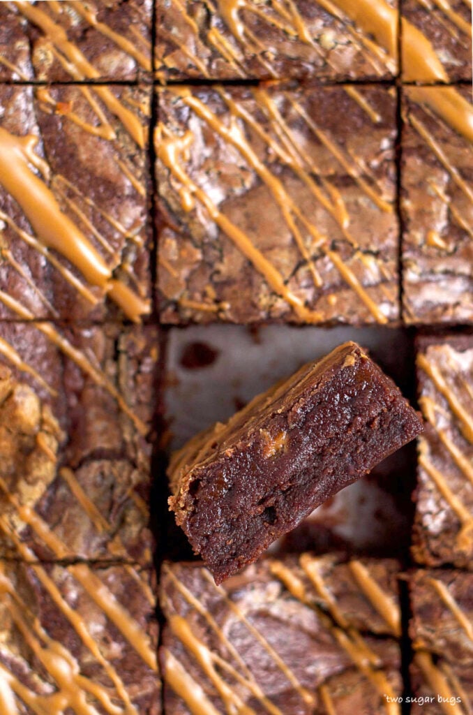 a cookie butter brownie on it's side showing inside fudgy texture